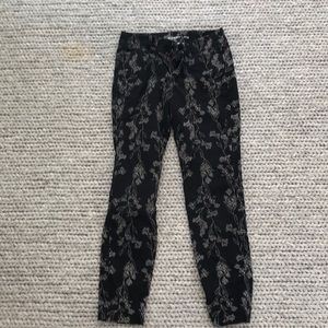 Black with white floral patterned pants